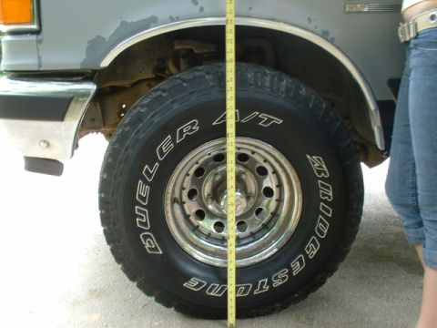1991 Ford Bronco - Front wheelwheel before lift. Measured almost 36"