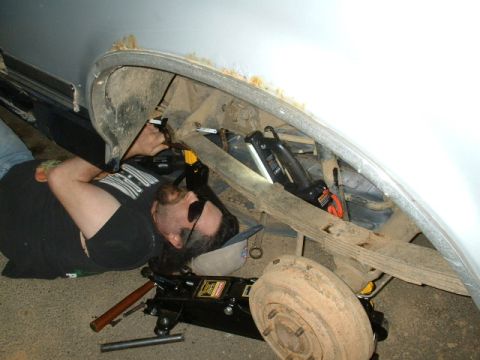 1991 Ford Bronco - Dave cutting away with a hacksaw blade
