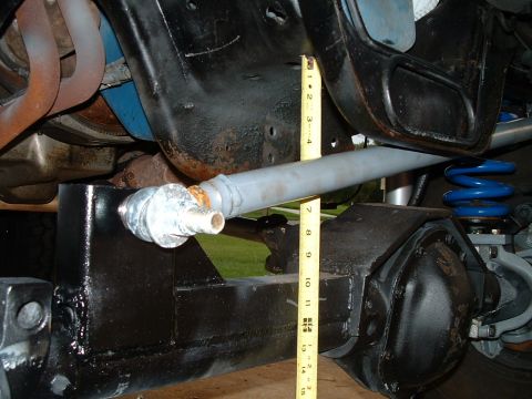 1995 Ford Bronco - Measuring suspension travel on a vehicle's steering linkage and axle components.