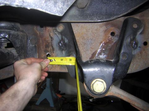 1995 Ford Bronco - bottom hole is 3" back, and a smidgen lower on the frame (this is to negate the lift lost by moving shackle farther back)