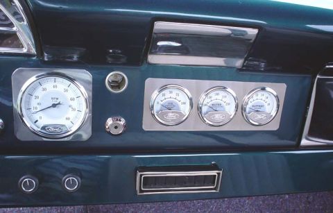 1956 Ford F-100 - Close-up of a vehicle's dashboard multiple gauges, including RPM, oil pressure, water temperature, and battery voltage.