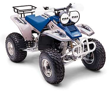 1990 Ford Probe - This Yamaha ATV is shown from the front, PIAA lights and a Supermotors.net watermark.