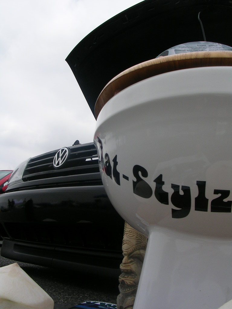 Black Volkswagen grille with emblem, front view