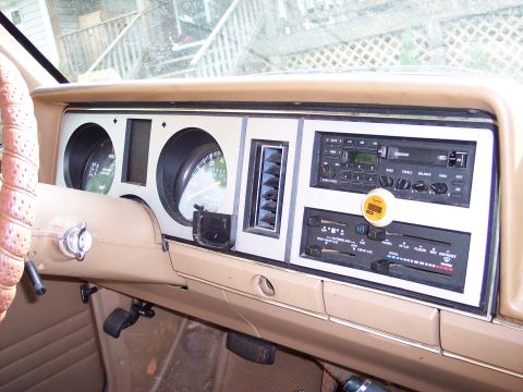 1986 Ford Bronco II - The interior dashboard of a 1986 Ford Bronco II features a radio, climate controls, and gauges.