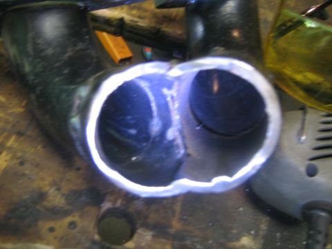 1978 Ford Bronco - Welded exhaust pipe with two openings, likely for a custom build.