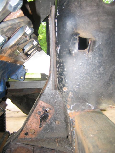 1978 Ford Bronco - Close-up view of a turbo header and exhaust manifold in an engine bay.