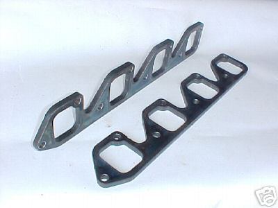 1978 Ford Bronco - A pair of exhaust headers are shown against a plain background.