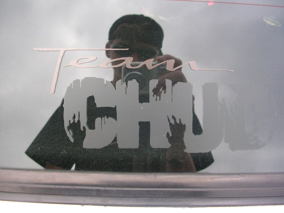 Decal on rear window reads 'Team CHU' with a dripping effect