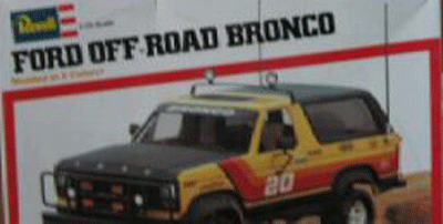 1990 Ford Bronco - Box-top artwork of a Revell 'Ford Off-Road Bronco' model kit showing a black and yellow off-road Bronco racer.