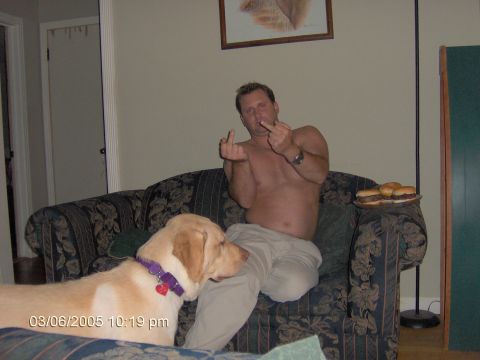 1978 Ford Bronco - Man and dog share a couch with a plate of burgers, timestamped March 6, 2005.