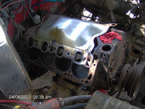 1978 Ford Bronco - Close-up view of an engine block with the intake manifold removed, revealing the cylinder bores and gasket surface. Date stamp indicates 04…