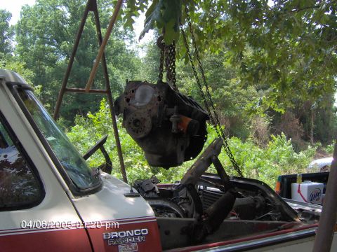 1978 Ford Bronco - Engine removal in progress, with the vehicle's side showing 'BRONCO RANGER XLT' badging.