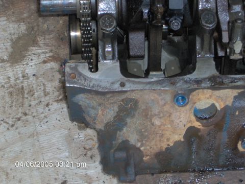 1978 Ford Bronco - This is a close-up view of an engine block, revealing internal components like the crankshaft and timing chain.