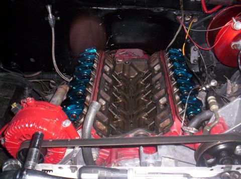 1989 Ford Bronco II - Close-up view of a modified engine, showing the valve train and alternator.