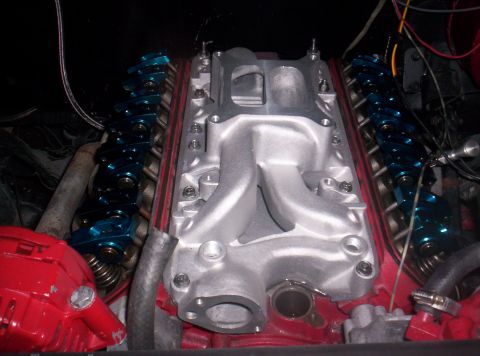 1989 Ford Bronco II - Close-up of an engine's intake manifold and valve train components.
