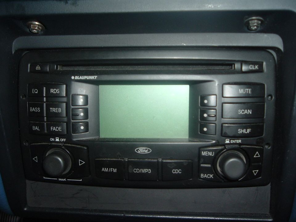 Car stereo with Blaupunkt and Ford logos, green display