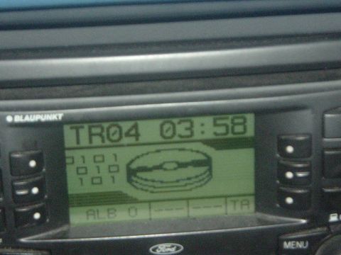 1993 Ford Taurus - Close-up of a Blaupunkt car stereo display with time and CD icon visible.
