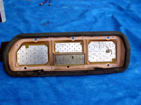 1978 Ford Mustang II - Circuit boards for a car's instrument cluster are laid out on a blue tarp.