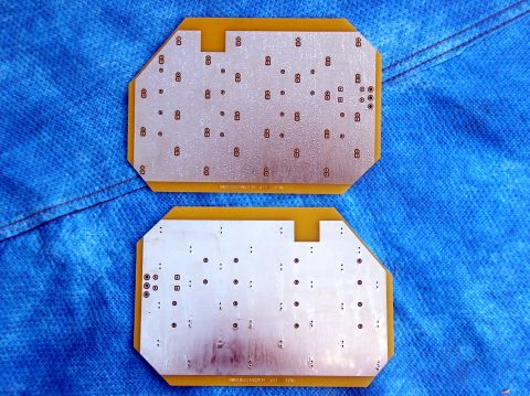 1978 Ford Mustang II - Two electronic circuit boards are shown from the back, resting on a blue fabric background.
