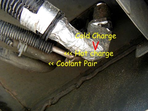 2002 Ford Excursion - Photo of the cold charge line re-insulated prior to entering from under the Auxiliary climate control unit.