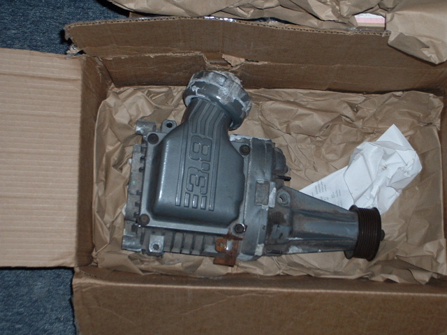 Supercharger labeled '3.8' in a cardboard box