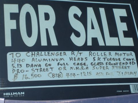 1985 Ford Mustang - A 'FOR SALE' sign details a 1970 Challenger R/T with various modifications and contact information.