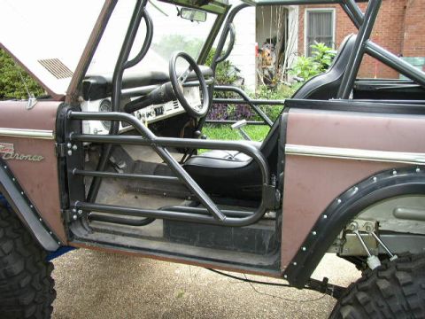 1995 Ford Bronco - This modified Ford Bronco features a custom roll cage and has had its doors removed.