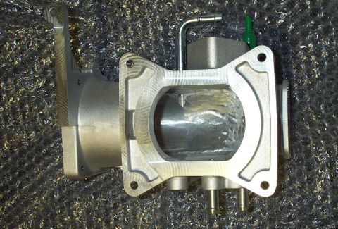 1998 Ford Crown Victoria - Close-up of an aftermarket ported upper plenum, likely for performance enhancement.