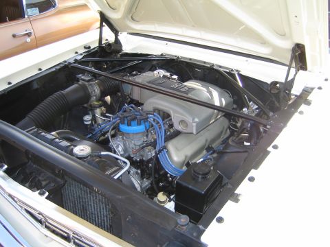 1985 Ford Mustang - Engine bay view of a Ford 5.0L V8, likely from the mid-1980s.