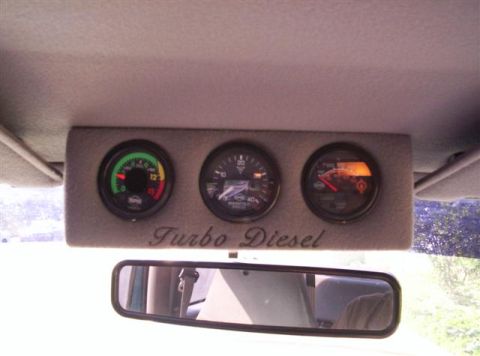 1995 Ford F-250 - Custom gauge pod with turbo diesel indicators is installed in the vehicle's interior.