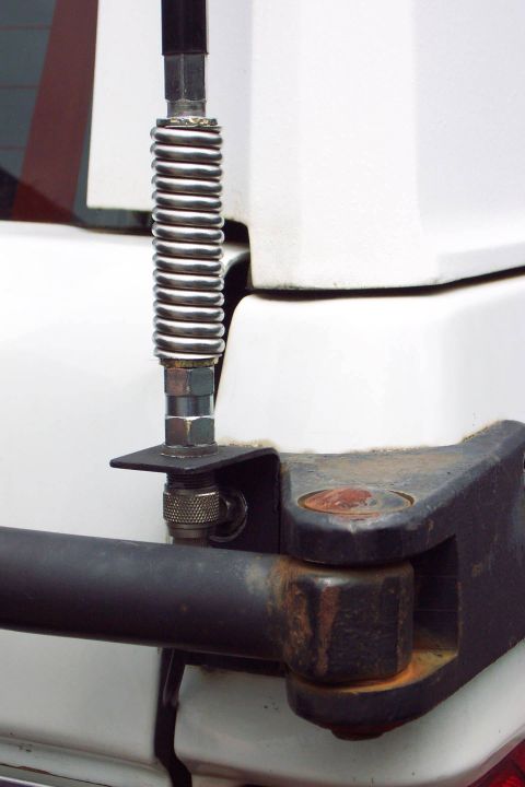 1996 Ford Bronco - CB Radio Antenna Mount Mounted to Tire Carrier Bracket (can't depend on the swing arm pin for good ground)