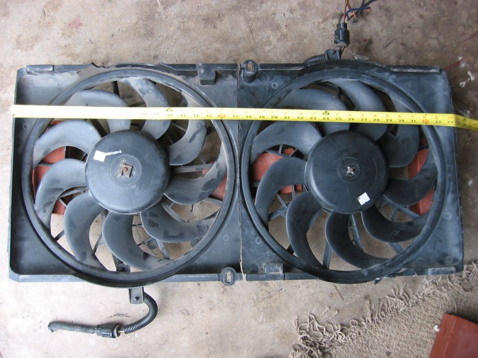 Dual Taurus fans mounted. This took some shroud cutting, and the are about as close to each other as possible. 34.5 inches end to end.