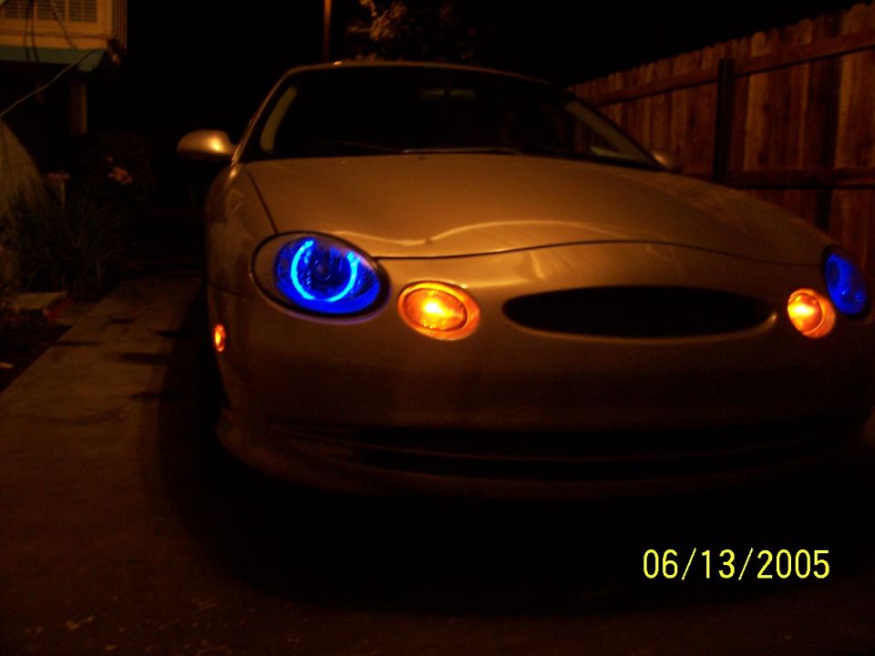 1998 Mercury Sable front with custom blue halo headlights and orange turn signals