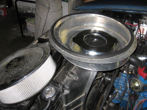 1972 Ford Mustang - The engine bay features an air cleaner assembly with a chrome lid and a visible air filter element.