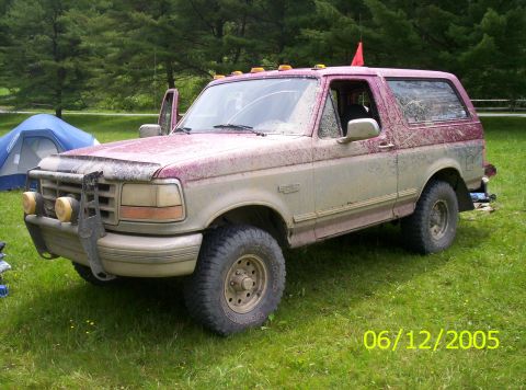 1995 Ford Bronco - This 1995 Ford Bronco is covered in mud, suggesting it has been used off-road.