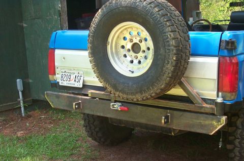 1987 Ford Bronco - Rear view of a 1987 Ford Bronco, equipped with a custom bumper and spare tire mount.