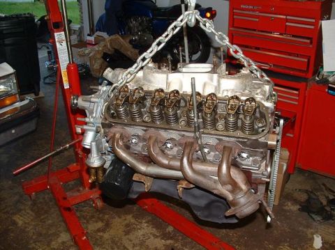 1985 Ford Crown Victoria LTD - Engine being hoisted for repair or replacement.