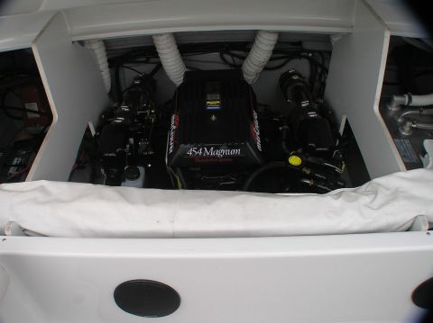 1997 Crownline 266 CCR - View of a boat's engine compartment a 454 Magnum engine.