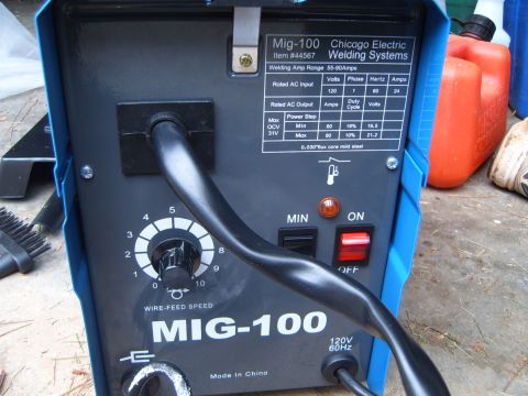 1988 Ford Bronco - Control panel of a Chicago Electric MIG-100 welding system shows wire-feed speed and amp settings.