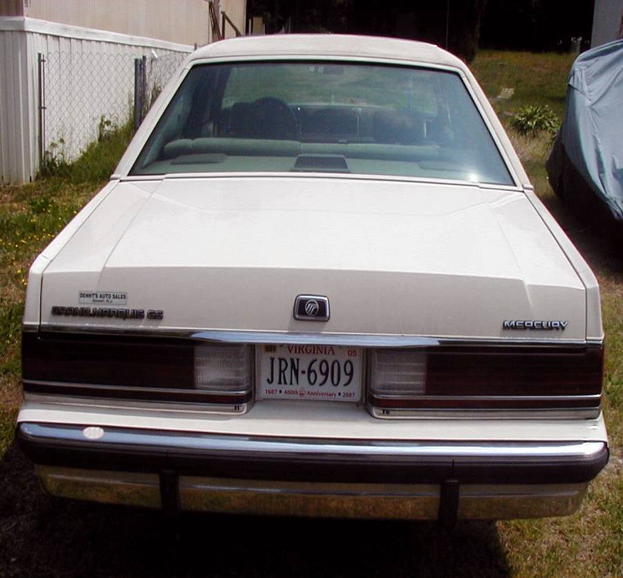 Rear of a white Mercury Grand Marquis GS sedan with Virginia plate JRN-6909