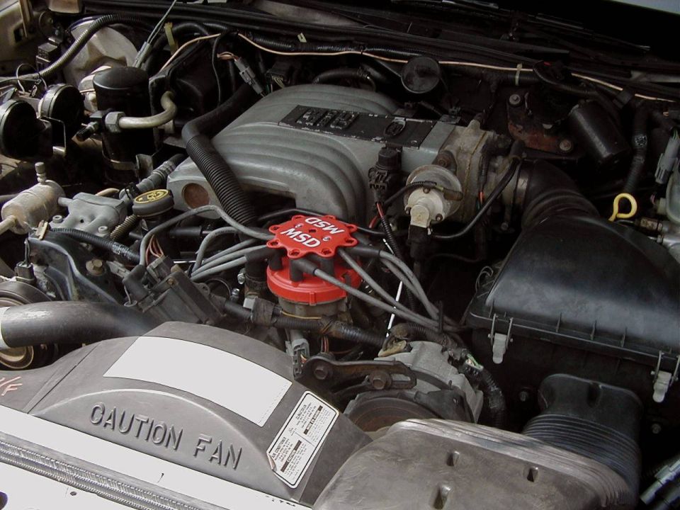 Engine bay with aluminum intake and red MSD distributor cap