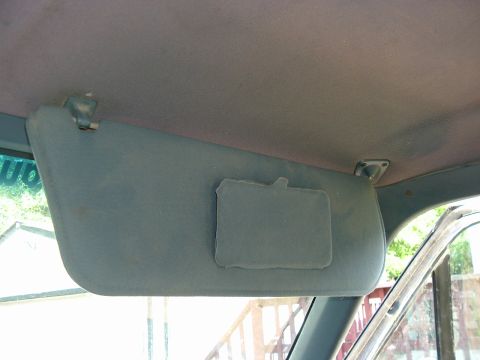 1989 Ford Bronco - Interior view of a gray sun visor in a 1989 Ford Bronco.