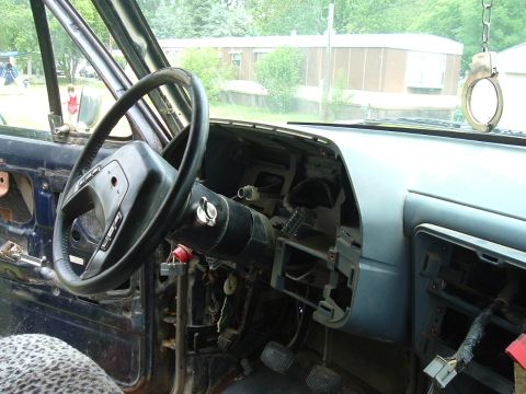 1989 Ford Bronco - Interior view of a 1989 Ford Bronco with the dashboard partially removed.