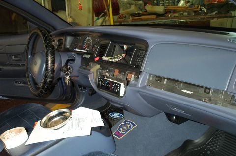 1998 Ford Crown Victoria - The following pictures document the removal of the gauge cluster and installation of the painted trim cover. First, the left and right hand…