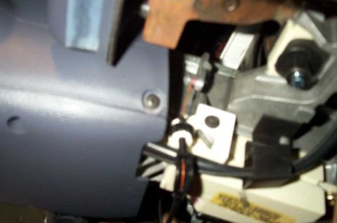 1998 Ford Crown Victoria - Detail shot of wiring and components within a custom gauge cluster trim panel.