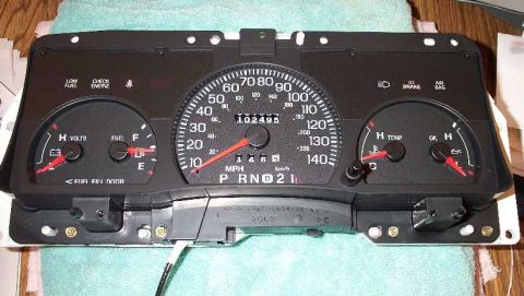 1998 Ford Crown Victoria - The gauge cluster for a 1998 Ford Crown Victoria shows the odometer reading 102,495 miles.