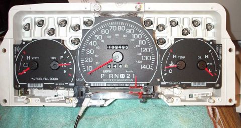 1998 Ford Crown Victoria - This is a vehicle's instrument cluster, showing various gauges and the odometer reading.