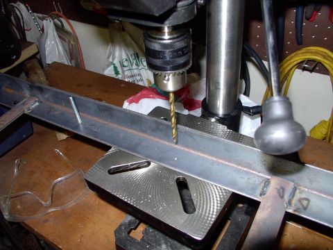 1986 Ford Bronco - Here I am drilling the second hole on my new mini-bench drill press. How can they make these for $30 ?!