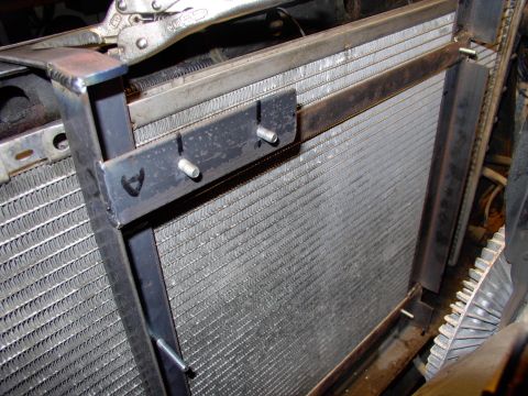 1986 Ford Bronco - Here you can see the way the strap steel will allow a couple of screws will secure the whole assembly to the upper rad support, and keep it…