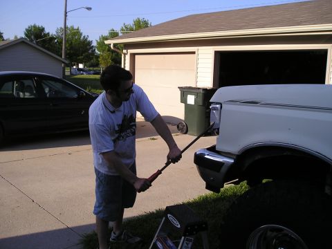 1990 Ford Bronco - remove corner lights(or the bucket) for easy access to the screws that hold the trim piece on.